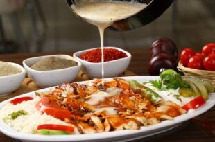 Turkish,Iskender,Kebab,With,Chicken,Donner,,Pouring,Butter