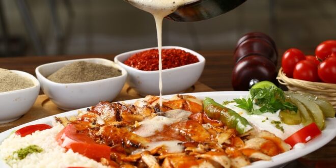 Turkish,Iskender,Kebab,With,Chicken,Donner,,Pouring,Butter
